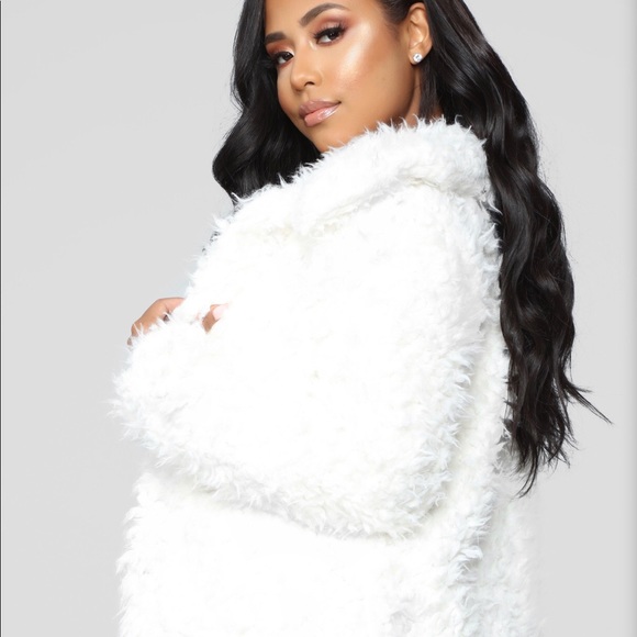 white fuzzy coat